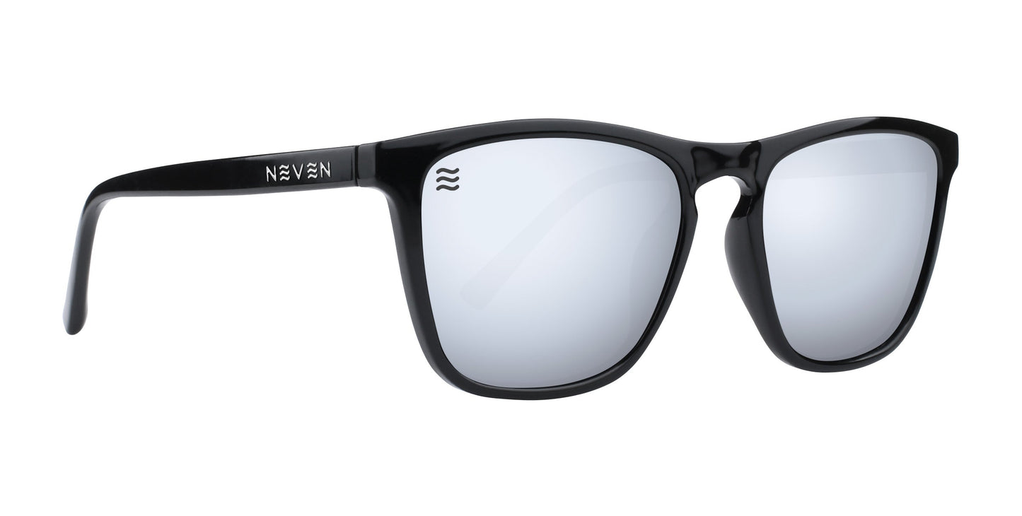 The Canova sunglasses from Neven Eyewear feature a matte black, rounded rectangle frame with shiny silver lenses and a white wavy logo engraved on the left temple, offering a modern, minimalist look from the Cambridge collection.