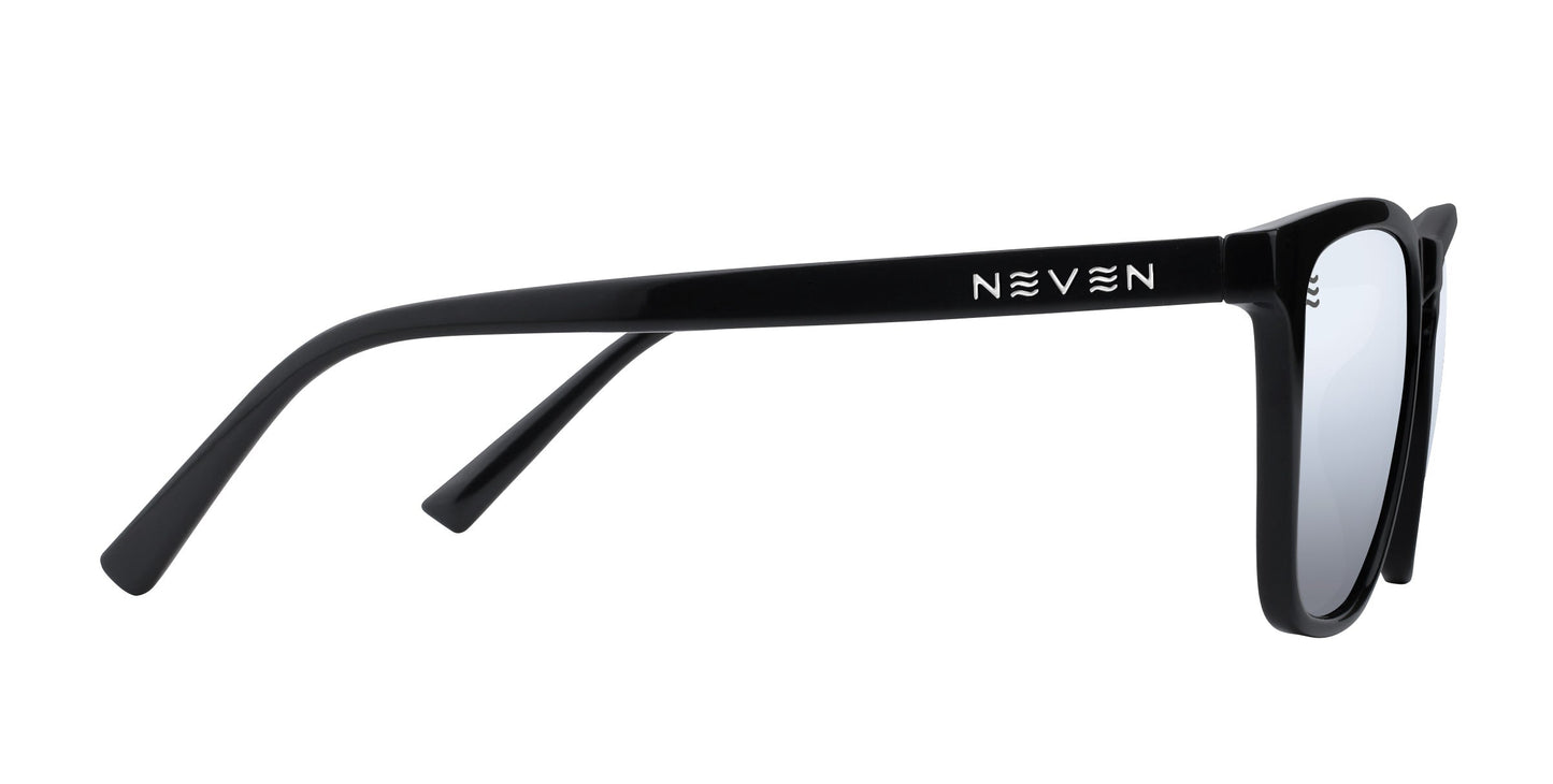 A pair of black rectangle Canova sunglasses from Neven Eyewear, viewed from the side with thick frames and arms. The left arm displays NEVEN in bold white letters. Lenses are slightly reflective with a subtle gray tint.