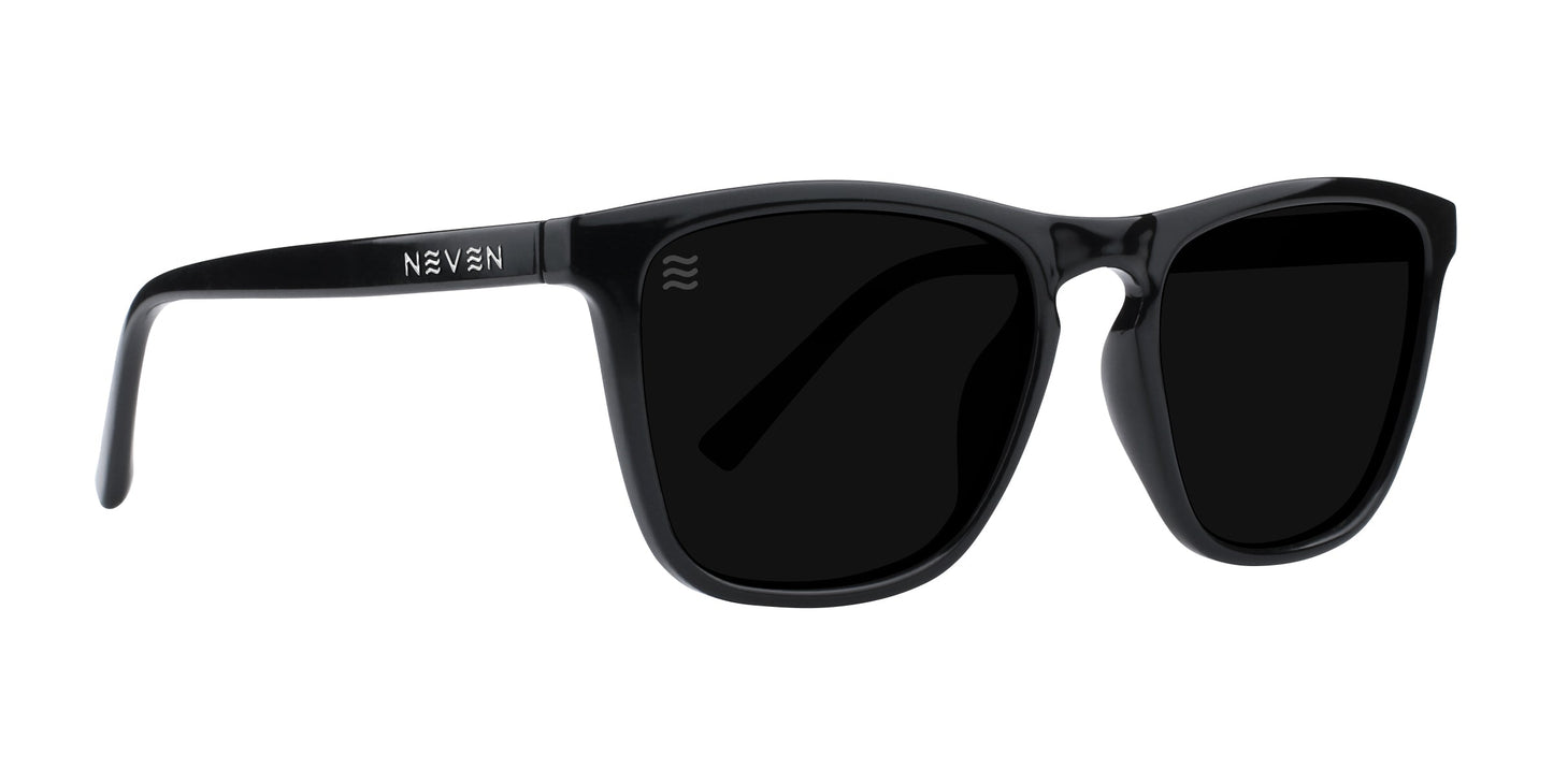 The Nix by Neven Eyewear are black rectangle sunglasses with dark polarized lenses, a glossy frame, and "NEVEN" plus a wave logo on the left arm. They feature UV400 protection for classic, minimalist style.