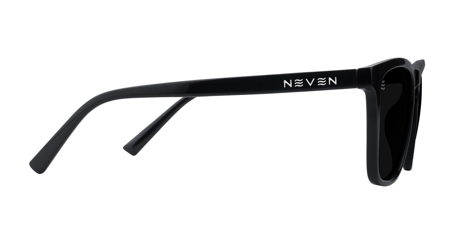 Side view of Neven Eyewear’s Nix sunglasses—black, rectangular, and glossy with “NEVEN” in white on the right arm. These modern polarized shades feature dark lenses and premium UV400 protection for minimalist style.