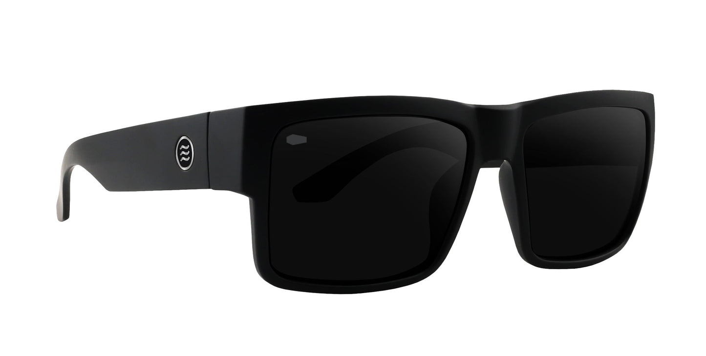 A pair of matte black square Relic sunglasses by Neven Eyewear, featuring thick frames, dark lenses, and solid black arms with a circular logo near the hinge. The bold, modern style is inspired by Tim Howley.