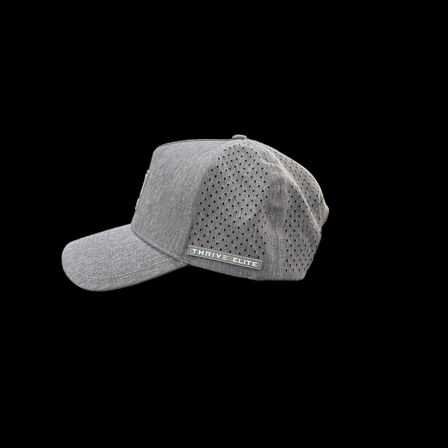 The Thrive Pickleball Elite Tour Hat, shown in gray with a curved brim and mesh side panels for ventilation, features a small THRIVE ELITE tag and is displayed in profile against a solid black background.