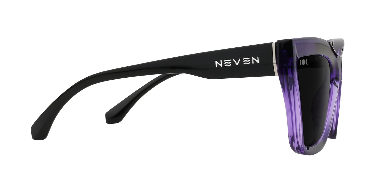 Side view of Ethereal cat-eye sunglasses by Neven Eyewear, featuring glossy black arms, a translucent purple frame front, and polarized UV400 dark lenses. “NEVEN” in white text decorates the arm. Plain white background.