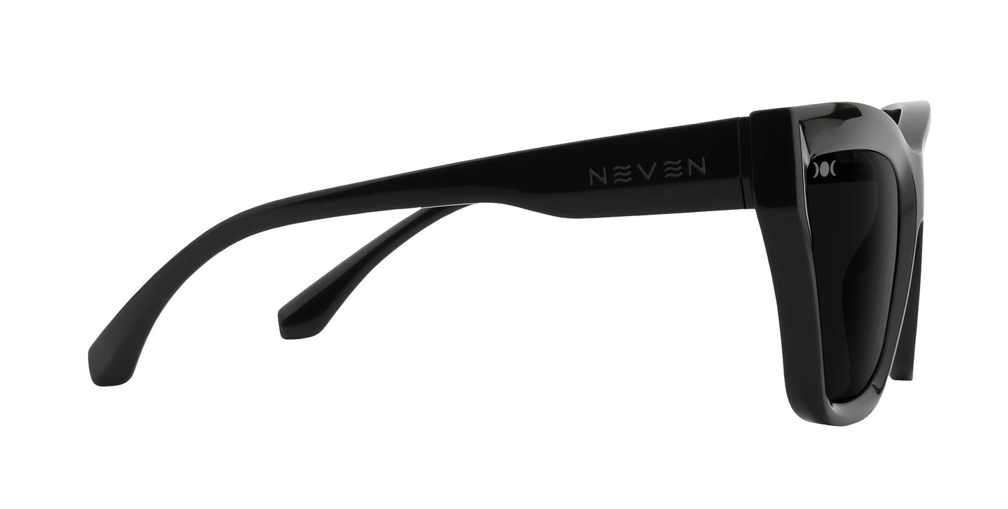 Nocturnal sunglasses by Neven Eyewear shown from the side, feature bold thick frames and temples, plus dark-tinted rectangular lenses. “Neven Eyewear” is subtly printed on the temple for a modern statement look.