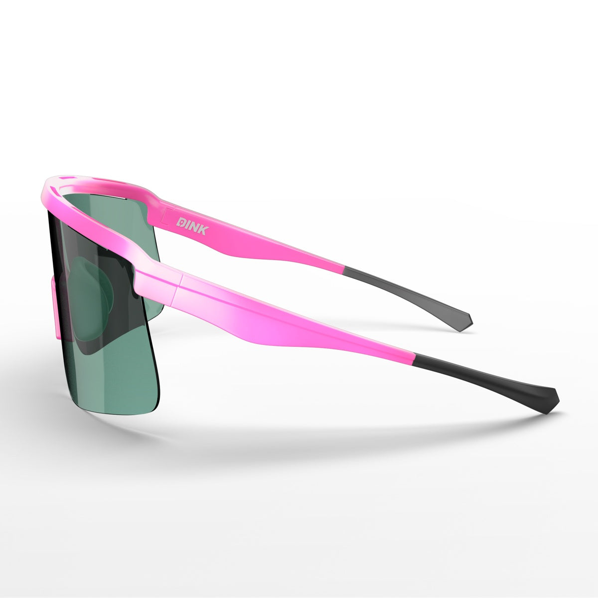 The Dink Eyewear Captiva Large Pink Pearl Sunglasses feature a bright pink frame, black rubberized temples, and large green-tinted rectangular lenses in a sleek, sporty wrap design, shown resting on a white surface.