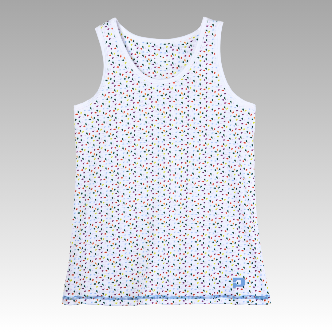 The Pretty Tank by Playly Store is a sleeveless white pickleball top with a round neck, small multicolored print, and white trim. Made from moisture-wicking mesh. Shown on a smooth gray gradient background.