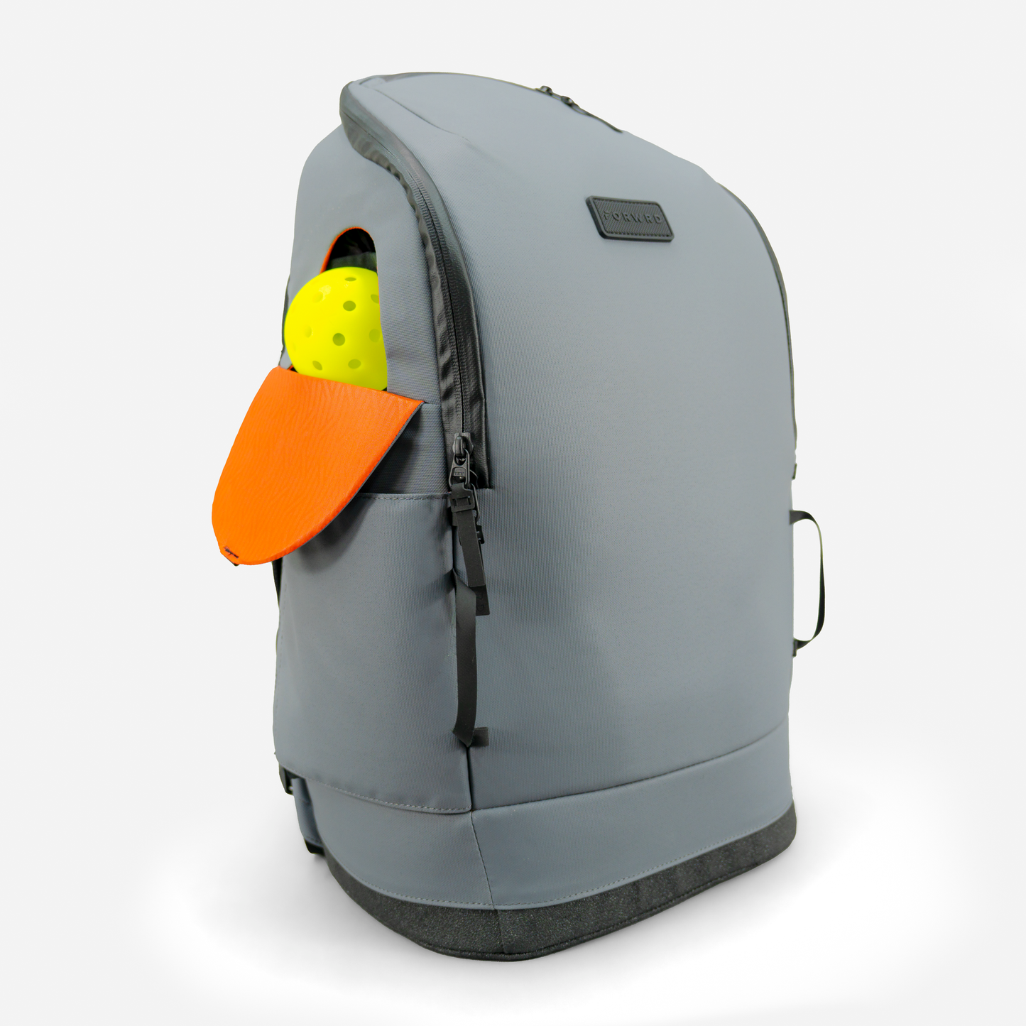The FORWRD Court Caddy Pickleball Bag features a modern gray design with black accents, top zipper, orange flap side pocket showing a yellow ball, and premium materials. A small black handle tops this stylish bag against a white background.