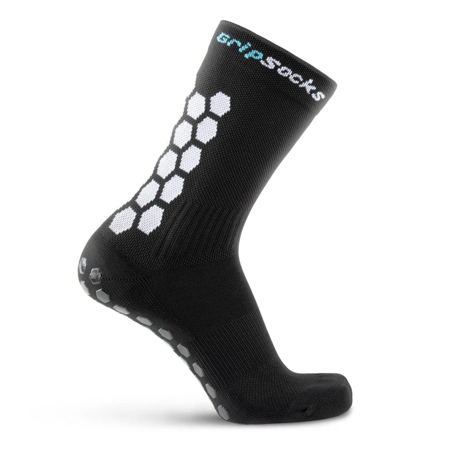 The Athletic Socks With Grips - Crew Height - Black by GripSocks feature white hexagonal grips on the sole and side, with "GripSocks" in white and teal at the top. Anti-blister design, set against a plain white background.