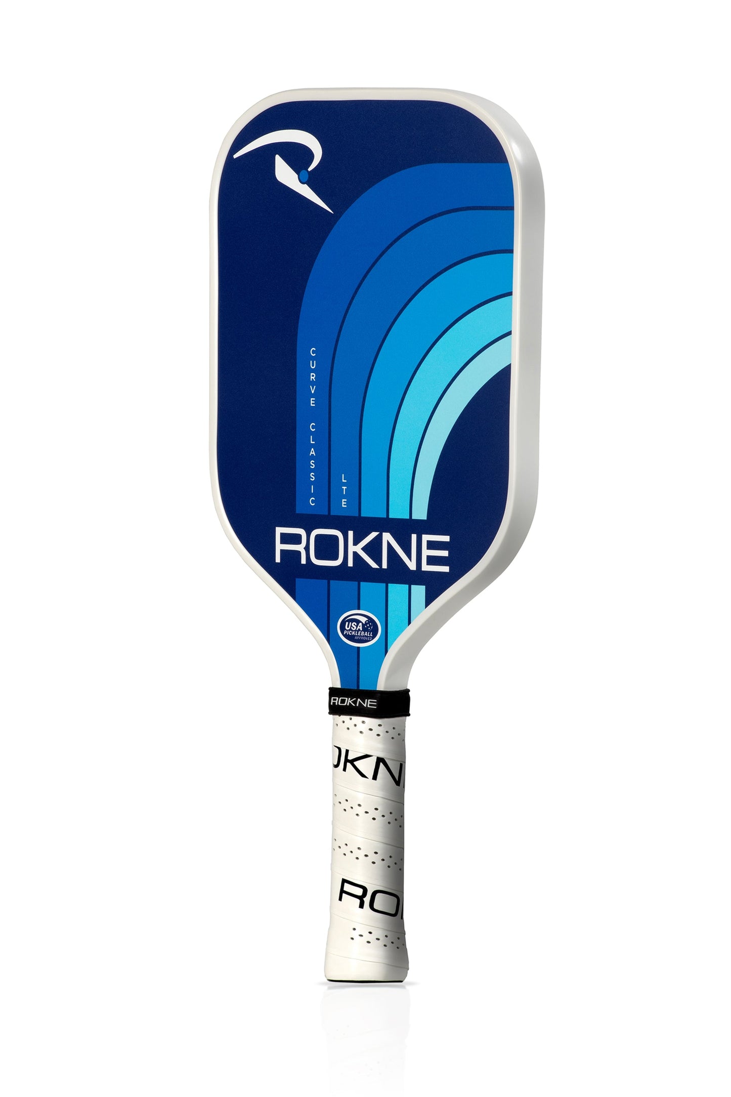 The ROKNE CURVE CLASSIC LTE pickleball paddle features a blue face with curved lines, a stylized “R,” and a white edge. Made of lightweight fiberglass with PROGrit texture, it has a white textured grip handle branded "ROKNE" in black.