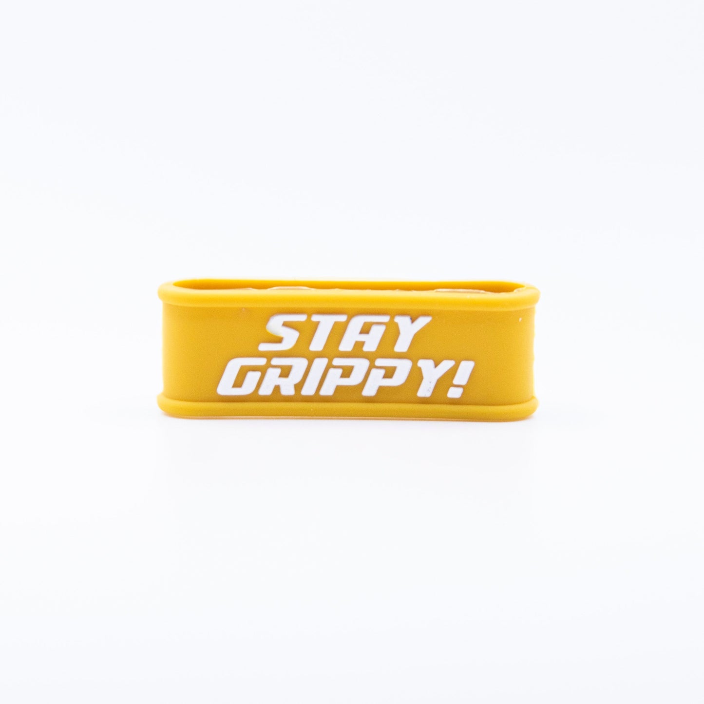 The Bodhi Performance Paddle Bands are yellow, rectangular silicone grip bands with rounded edges and “STAY GRIPPY!” printed in bold white letters—perfect pickleball paddle accessories for enhancing your game.