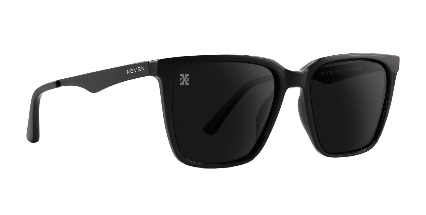 The Neven Eyewear Mamba sunglasses feature a sleek black rectangular design with thick frames and dark polarized lenses. A silver Neven Eyewear logo adorns the left temple, and a small X logo is etched near the hinge for a modern, unisex look.