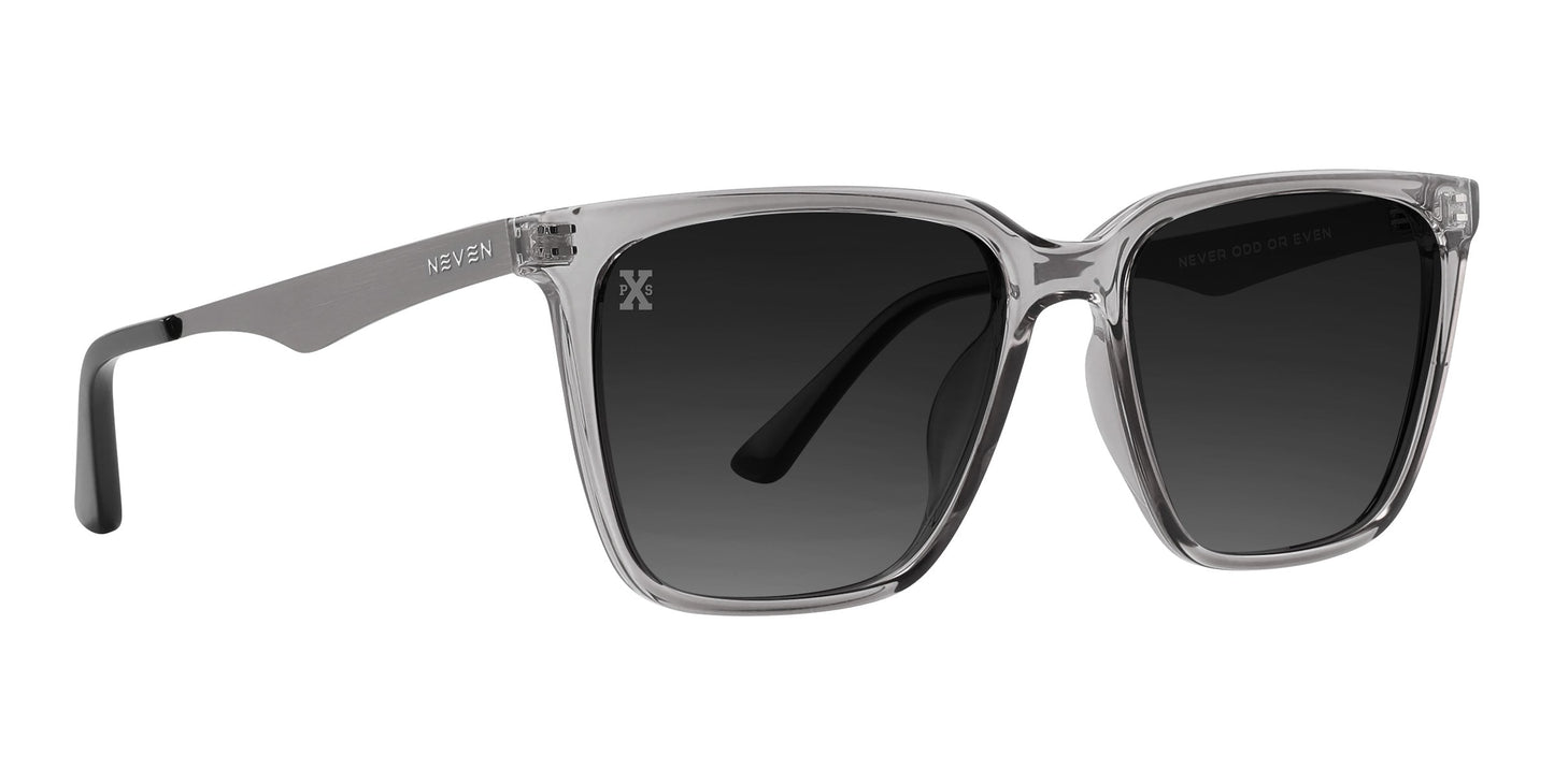Neven Eyewear’s Tornado sunglasses feature clear square transparent frames, gray polarized lenses, and silver temples with “NEVEN” on the left arm—a sleek, modern mix of clear and metallic elements.