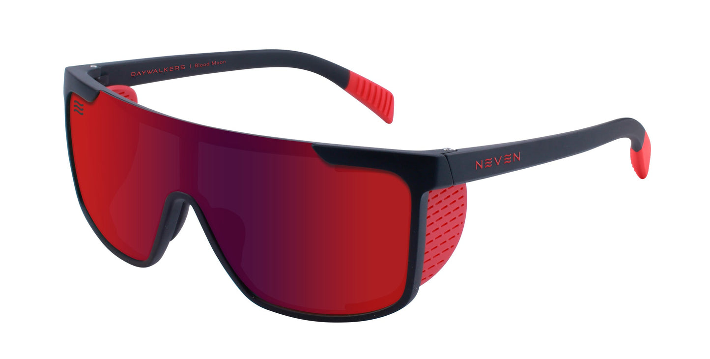 Neven Eyewear’s Blood Moon sunglasses feature a sleek black frame with bold red accents, wraparound impact-resistant lens for full coverage, and NEVEN branding with red grips and textured red detailing on the arms.