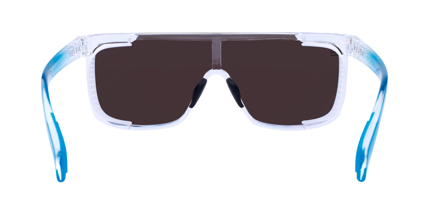 Neven Eyewear’s Iced Earth sunglasses feature large rectangular dark lenses, a transparent frame with a blue gradient on wide arms, and UV400 protection—sporty, modern shades perfect for any adventure.