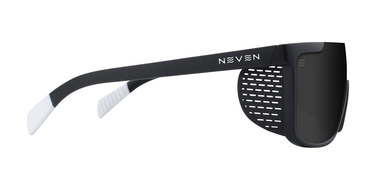 Pitch Black by Neven Eyewear: black sunglasses with white-tipped arms, perforated side shields, UV400 impact-resistant lenses, and extra lateral sun protection. "NEVEN" is printed in white on the left arm.