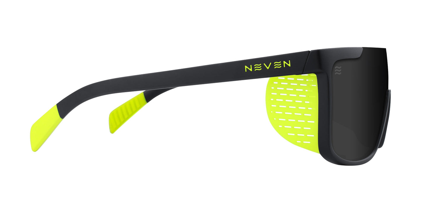 Side view of Whistler sunglasses by Neven Eyewear, featuring polarized UV400 lenses, neon yellow temple tips, and perforated removable side shields. The Neven name in yellow is on the temple; dark lenses slightly wrap the sides.