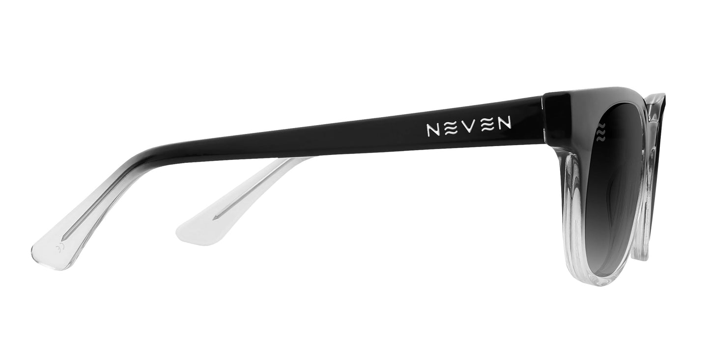 A close-up side view of the Fang sunglasses by Neven Eyewear, featuring square gradient frames that are mostly black fading to clear at the ends and around the dark lenses. "NEVEN" in white stylized text appears on the temple arm near the hinge.