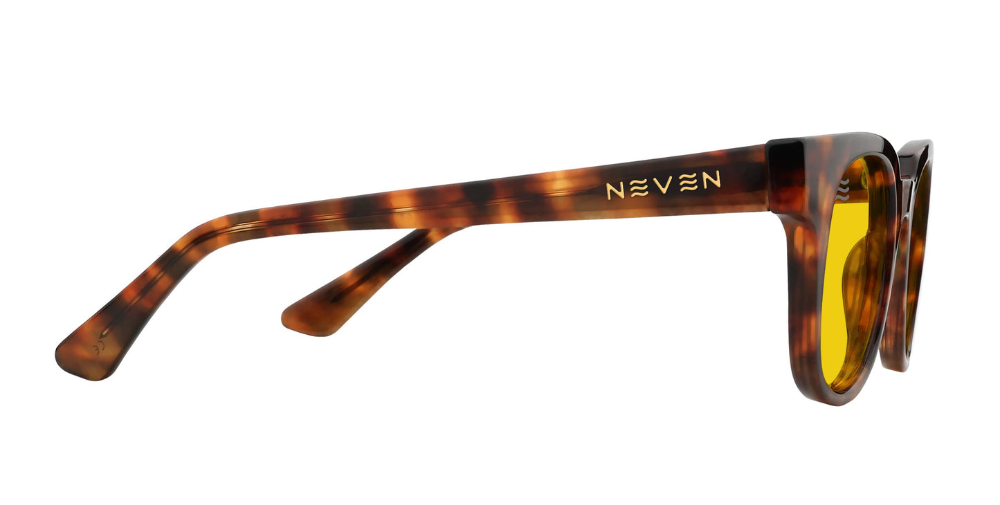 Side view of Neven Eyewear’s Gryphon sunglasses featuring rectangular polarized yellow lenses, a mottled brown tortoiseshell frame with gold NEVEN branding near the hinge, and slightly curved arms for comfortable wear.