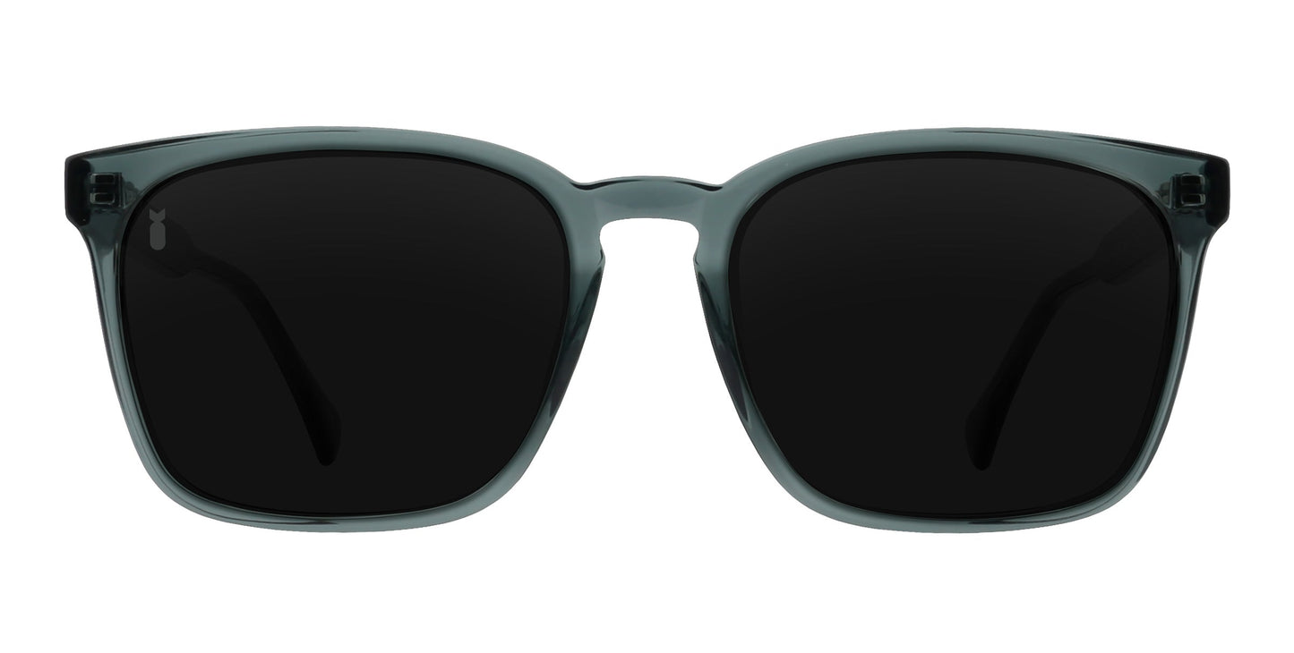 The Lenny sunglasses from Neven Eyewear's Divebomb Collection have thick, translucent dark green rectangular frames and large black lenses for a bold, modern look.