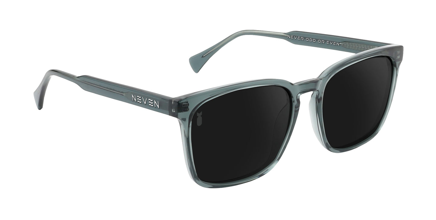 The Lenny sunglasses from Neven Eyewear feature square black lenses and translucent gray rectangular frames, with curved arms displaying NEVER and NEVER ODD OR EVEN in white text, part of the Divebomb Collection. Shown on a white background.