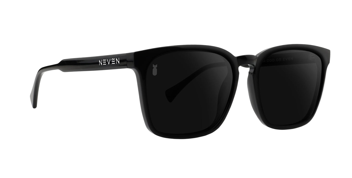 The Rufus sunglasses from Neven Eyewear feature a sleek black rectangular frame with dark polarized, slightly reflective lenses and “NEVEN” in silver on the left temple. Part of the Divebomb Collection, their simple design is modern and striking.