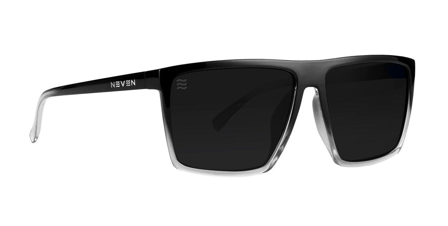 The Colorado Bulldog XL by Neven Eyewear are rectangular black polarized sunglasses with thick frames that fade to clear at the bottom, dark lenses, and NEVEN branding on the left arm near the hinge. Set against a plain white background.