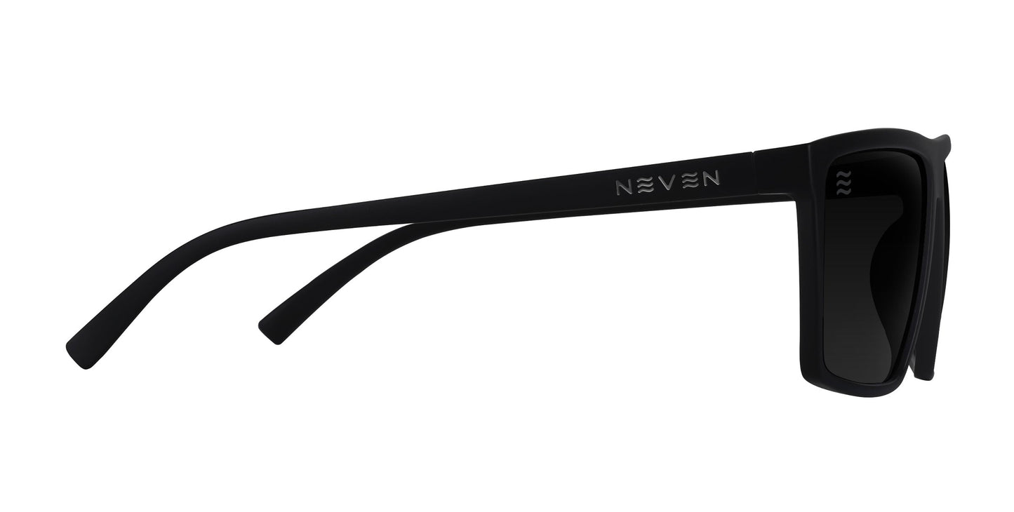 A side view of Neven Eyewear NYC XL sunglasses with a black rectangular frame and dark polarized lenses. Matte black arms curve gently, NEVEN in silver by the hinge, visible hinges, all set against a clean white background.