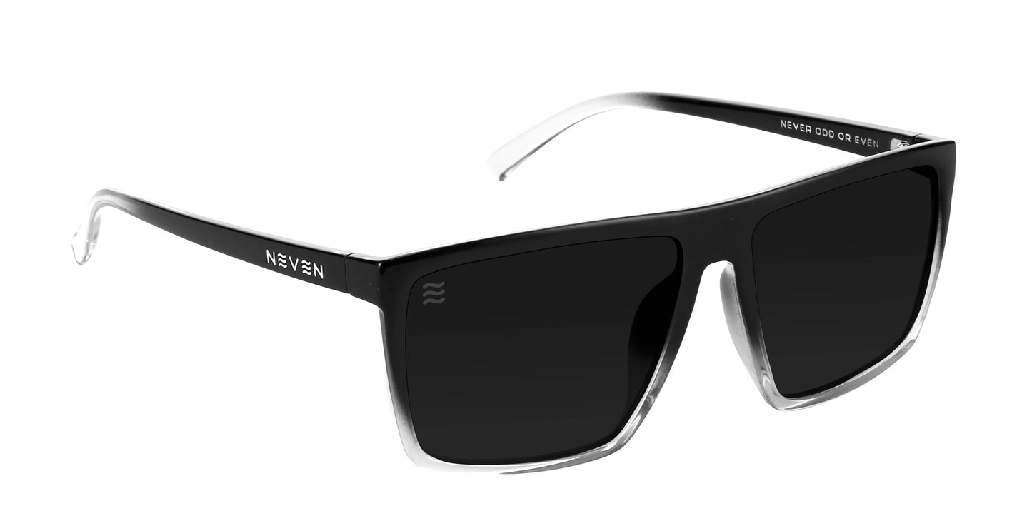 The Colorado Bulldog by Neven Eyewear features black rectangular frames that gradient to clear, with matching temples fading to clear tips. These polarized shades offer UV400 protection, impact-resistant lenses, and "NEVEN" with "NEVER GOD OR EVEN" in white on the temples.