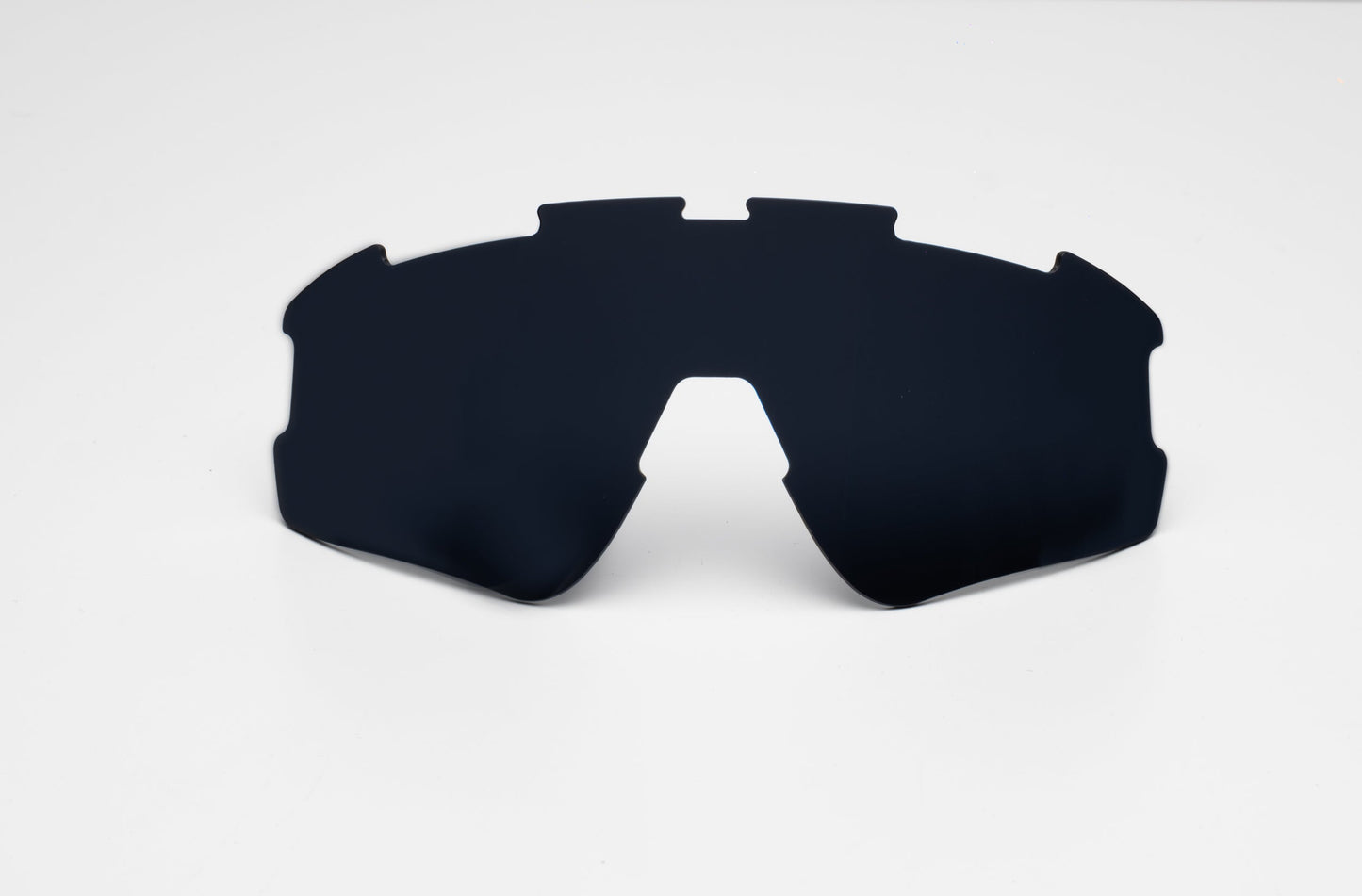 Displayed against a white background, the Thrive Pickleball Additional Lens Color showcases a single, dark-tinted, shield-style design with gray UV-protective lenses—perfect wraparound sunglasses for pickleball enthusiasts.