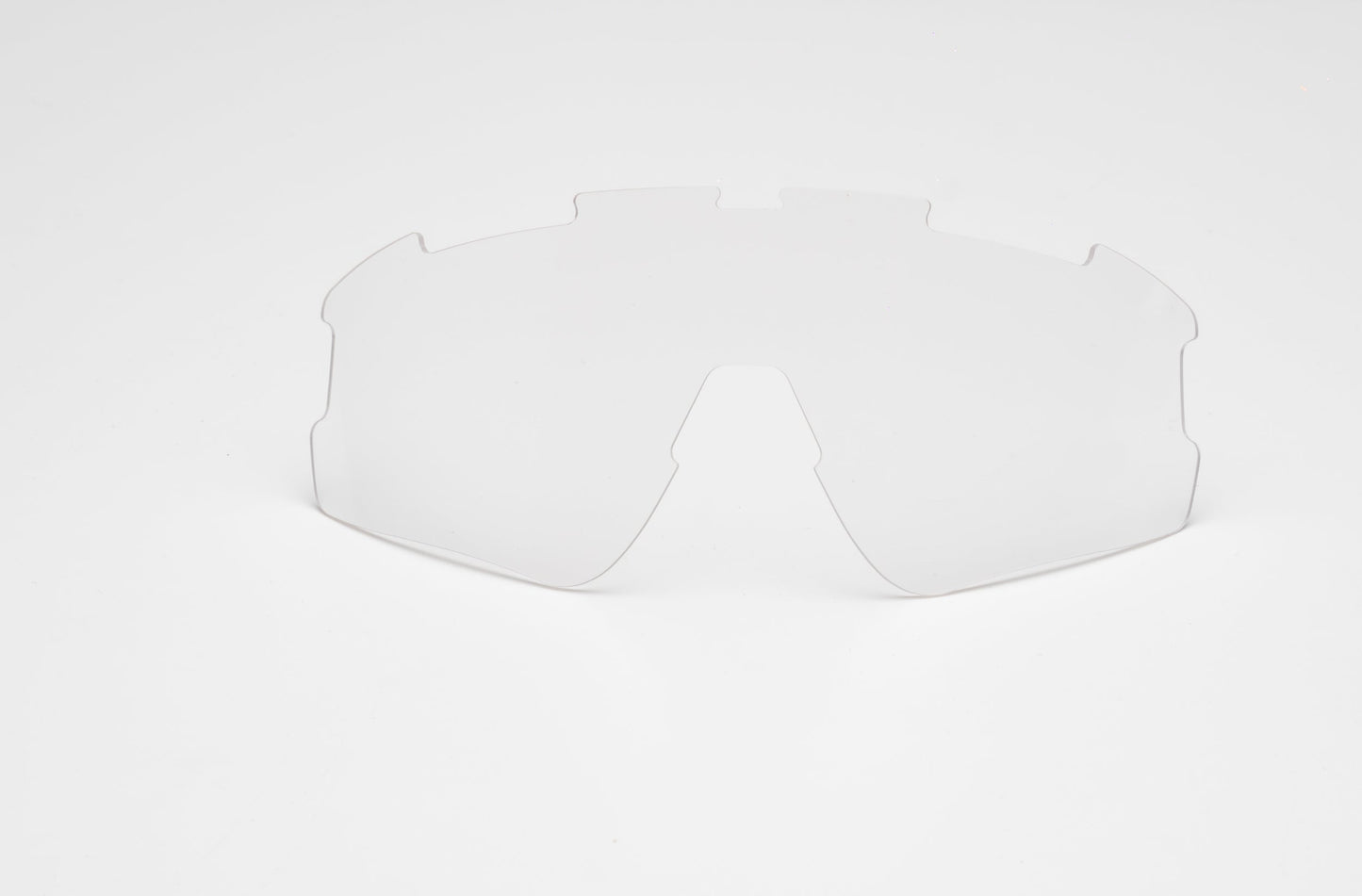 The Thrive Elite Pickleball Glasses by Thrive Pickleball feature a transparent, curved photochromic replacement lens with notched edges and a central nose cutout, displayed against a plain white background.