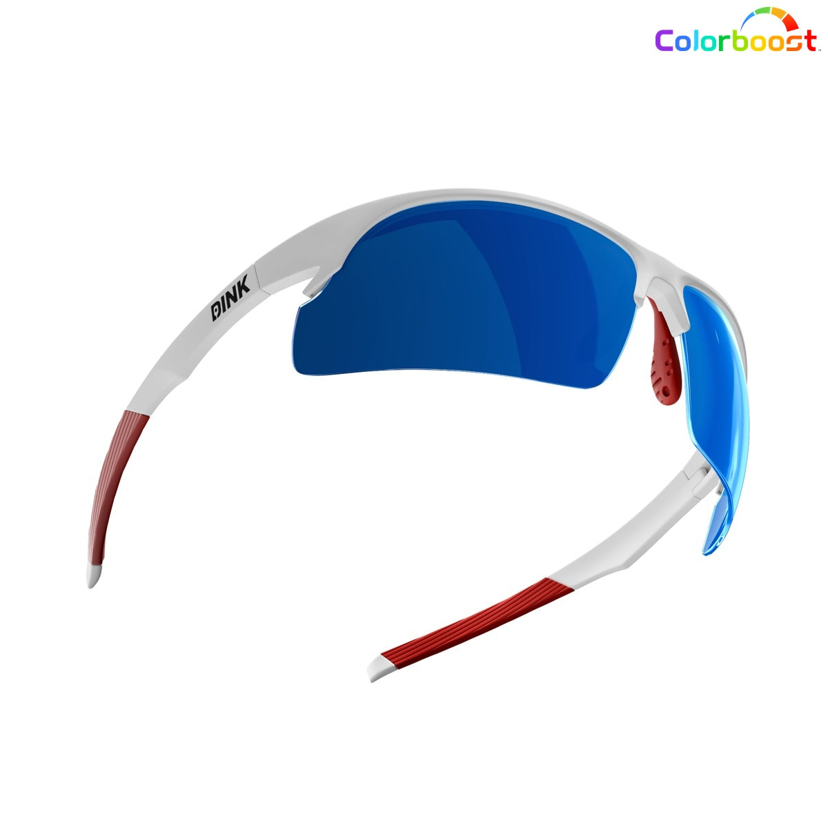 Daytona Pickleball Sunglasses by Dink Eyewear feature a sporty aerodynamic design with a white semi-rimless frame, blue reflective lenses, and red textured arms. “Dink” is printed on the side, and the Colorboost logo adorns the top right corner.