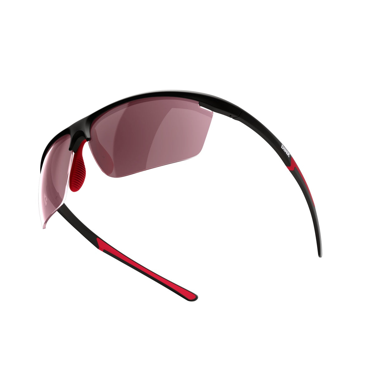 The Daytona Petite Sunglasses by Dink Eyewear feature black and red frames, red nose pads, mirrored lenses, and sporty wrap design. Aerodynamic lines and red temple accents create a dynamic, modern look with a snug fit.