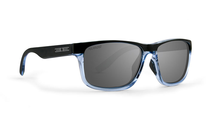 The Delta sunglasses by Epoch Eyewear feature dark polarized lenses, vivid blue transparent rims with black arms, a white stylized EE logo on the left arm, and a modern rectangular glossy frame with a lightweight design.