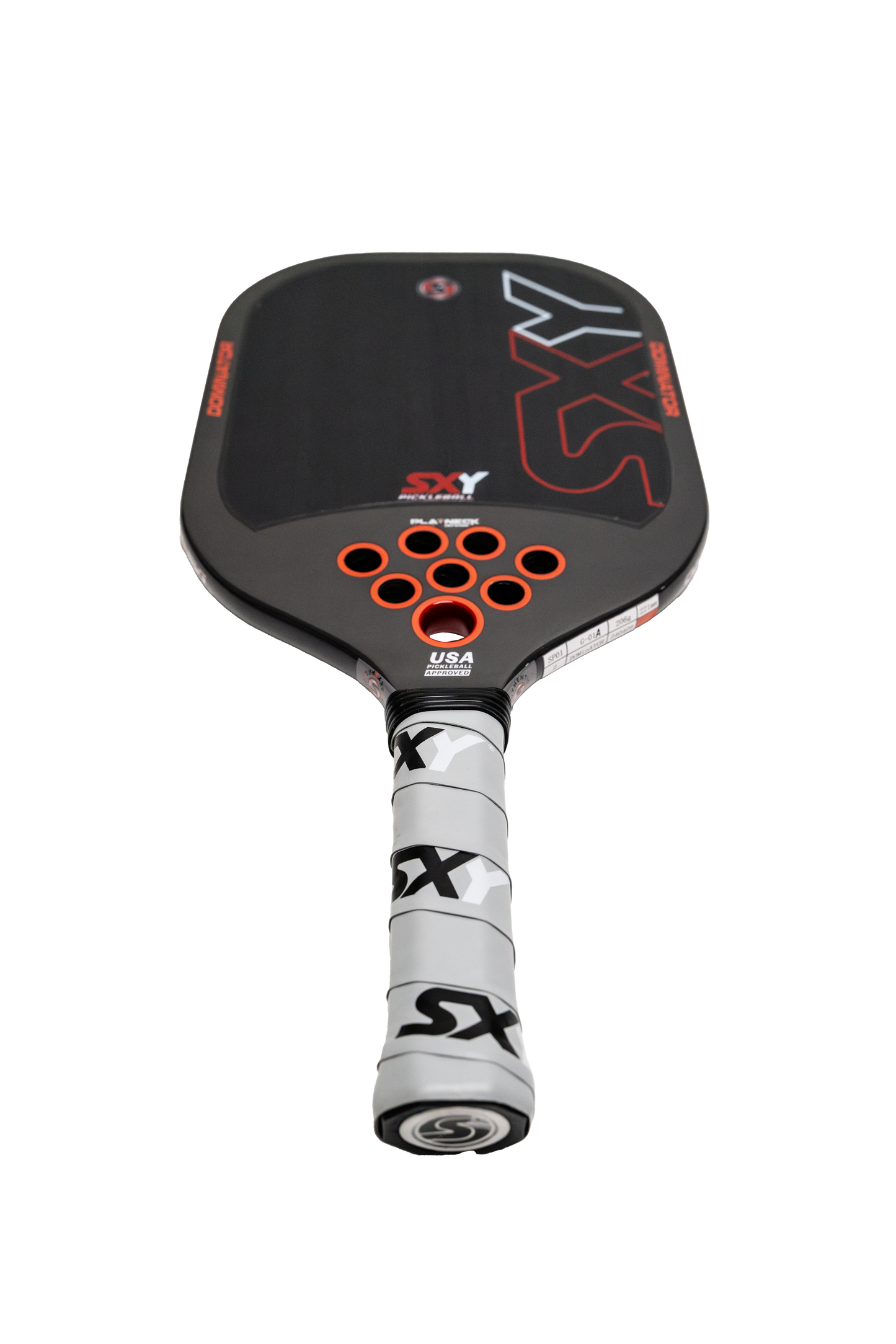 The SXY PKL Dominator Pickleball Paddle by SEXY Brand features a black carbon fiber face, red and gray SX logo, red accents, circular cutouts above a white grip with black SX text on the handle. Set against a plain white background.