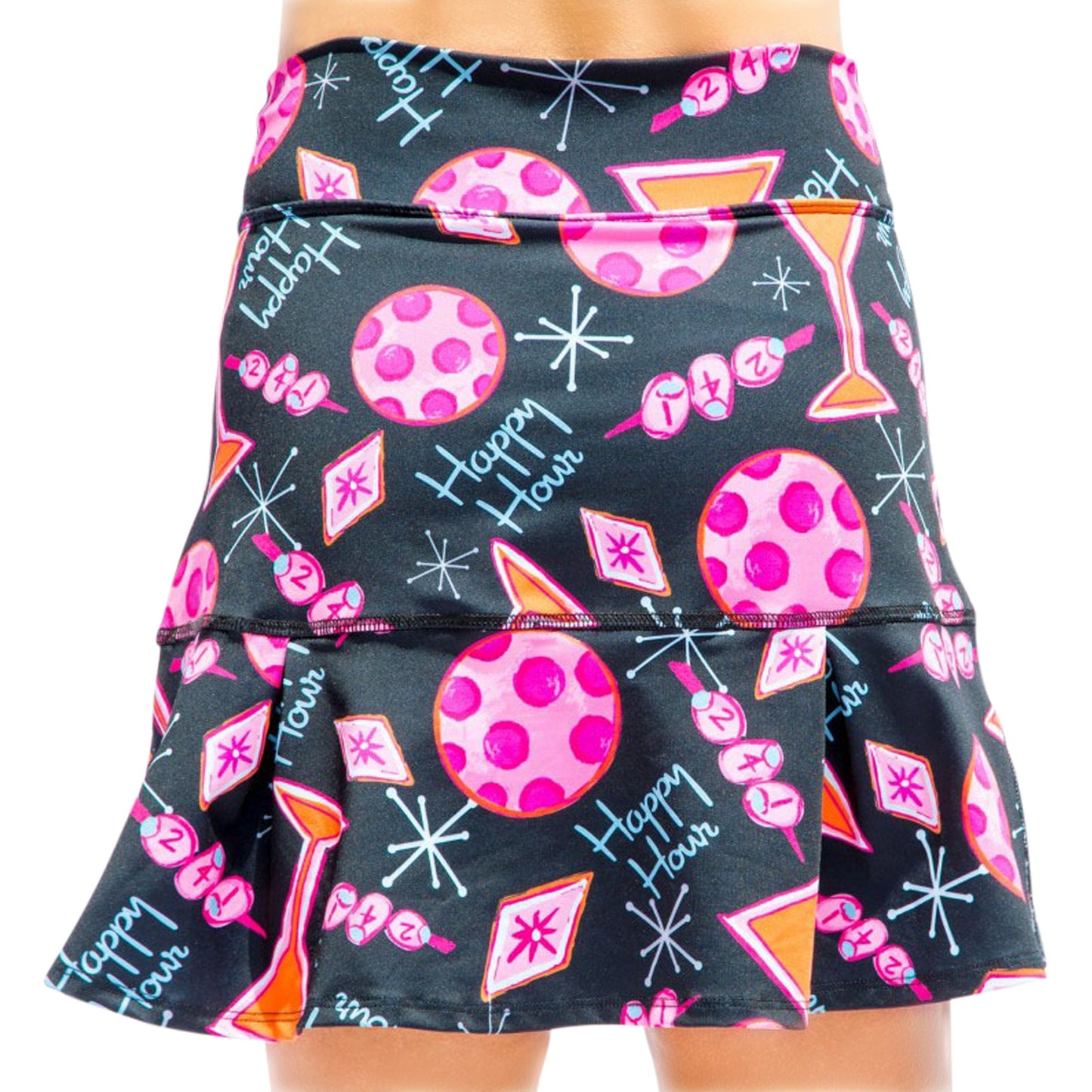 A woman wearing the Pickleball Bella PB Drop Pleat Skort Martini 2-4-1 Happy Hour, featuring a playful Martini Happy Hour print.