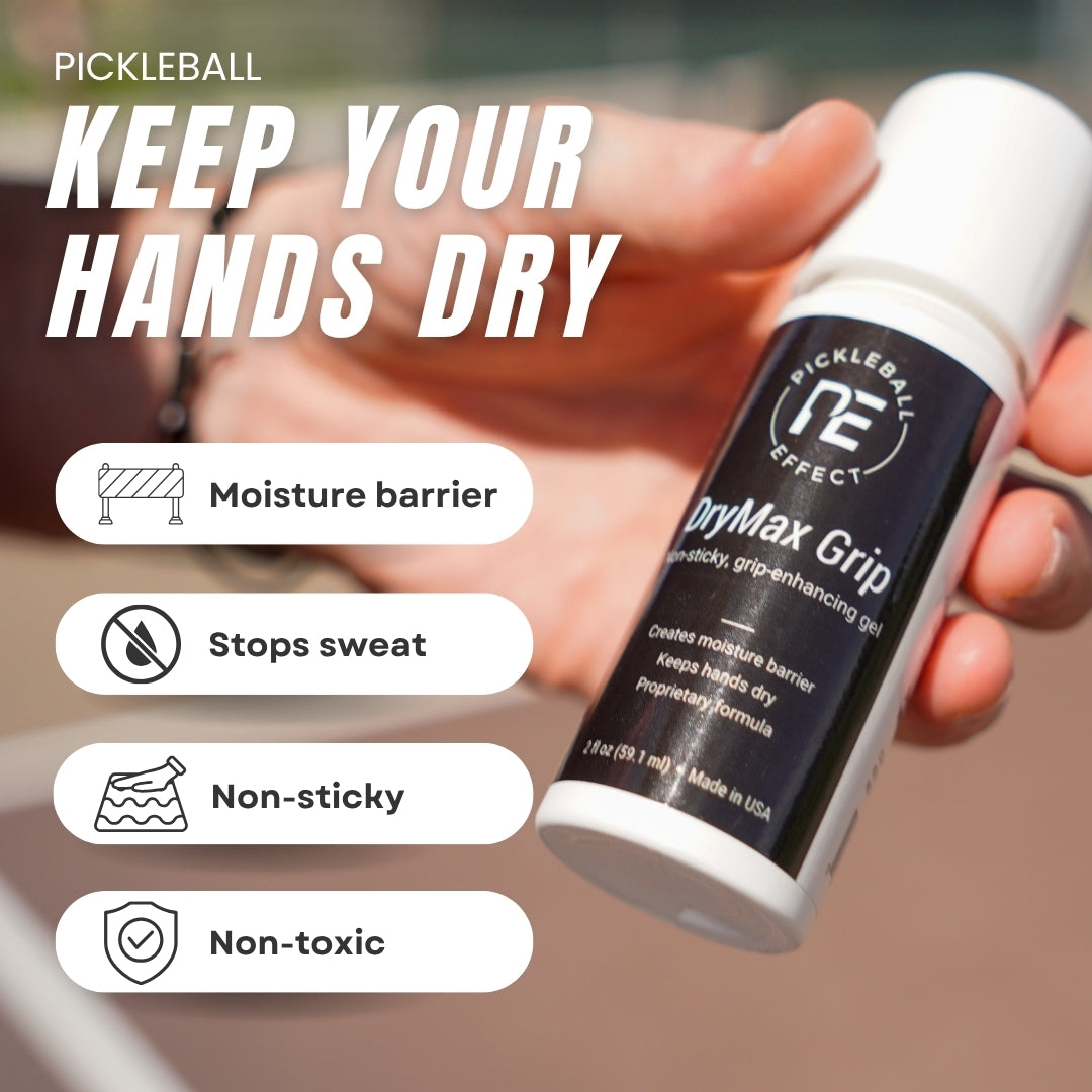 A hand holds a white DryMax Grip bottle by Pickleball Effect Shop, a hand grip gel. Overlay text reads "KEEP YOUR HANDS DRY." Four icons show: moisture barrier, stops sweat, non-sticky, and non-toxic. Outdoor court is blurred in the background.