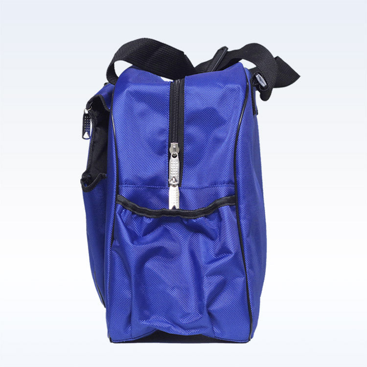 The Pickleball Bella PB Duffle Bag Cobalt Blue is shown from the side, displaying a vertical zippered paddle pocket, small mesh side pocket, and black adjustable shoulder strap against a plain light background.