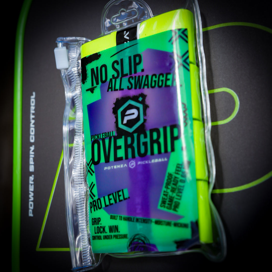 A 4-pack of Potenza Pickleball PROX Tacky Overgrip in bright yellow and purple, labeled “NO SLIP. ALL SWAGGER.” and “PRO LEVEL.”, comes in a clear plastic case with green accents on a black background. Moisture-wicking grip included.