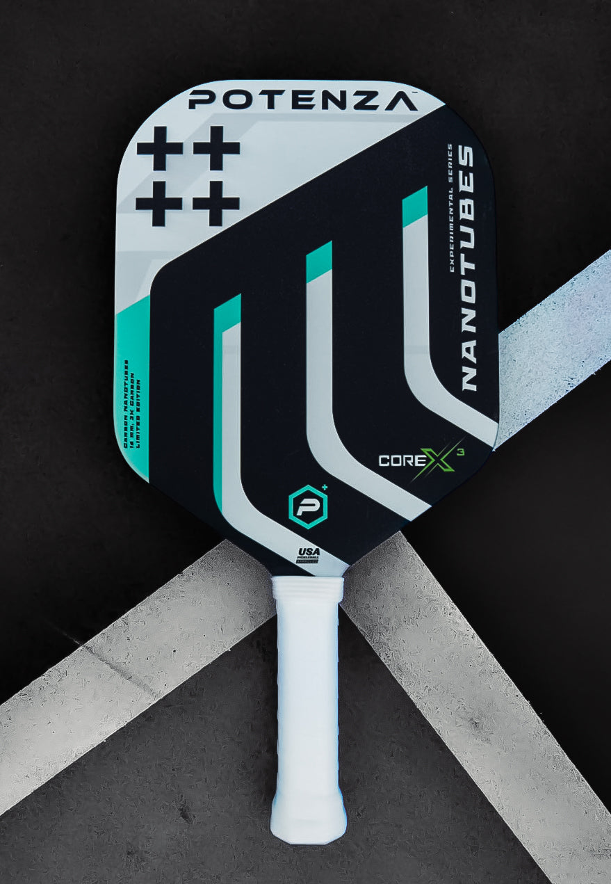 The Potenza Pickleball Carbon Nanotubes+ COREx3 paddle features a black, white, and teal geometric design, carbon nanotube construction, and a wrapped white handle—modern style meets pro-level performance.