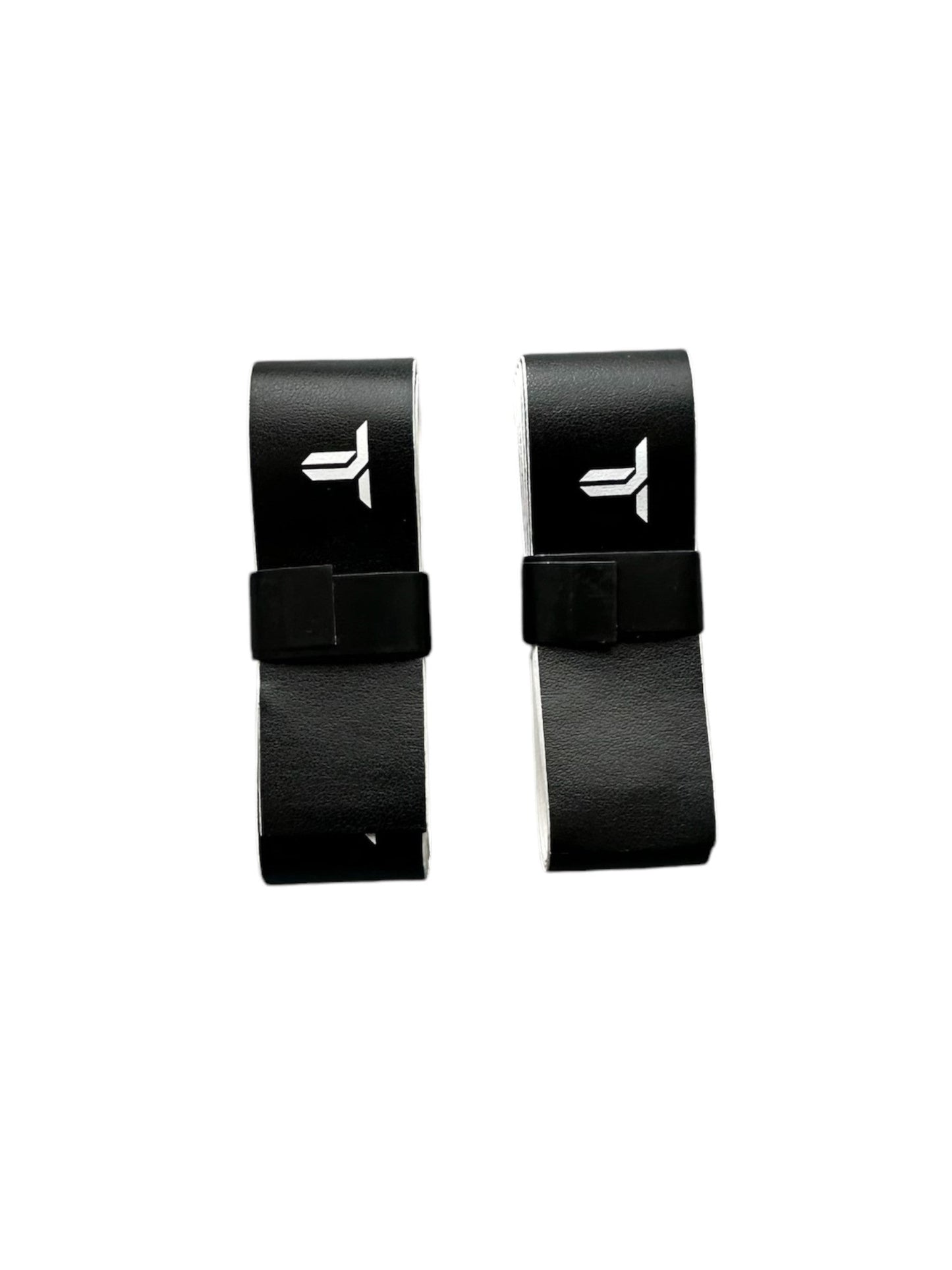 Two black Edge Guard Tapes by Thrive Pickleball, each featuring a white minimalist P or abstract arrow logo, are shown parallel on a white background. Each tape has a loop, blending modern style with paddle edge guard protection. Set of 2.