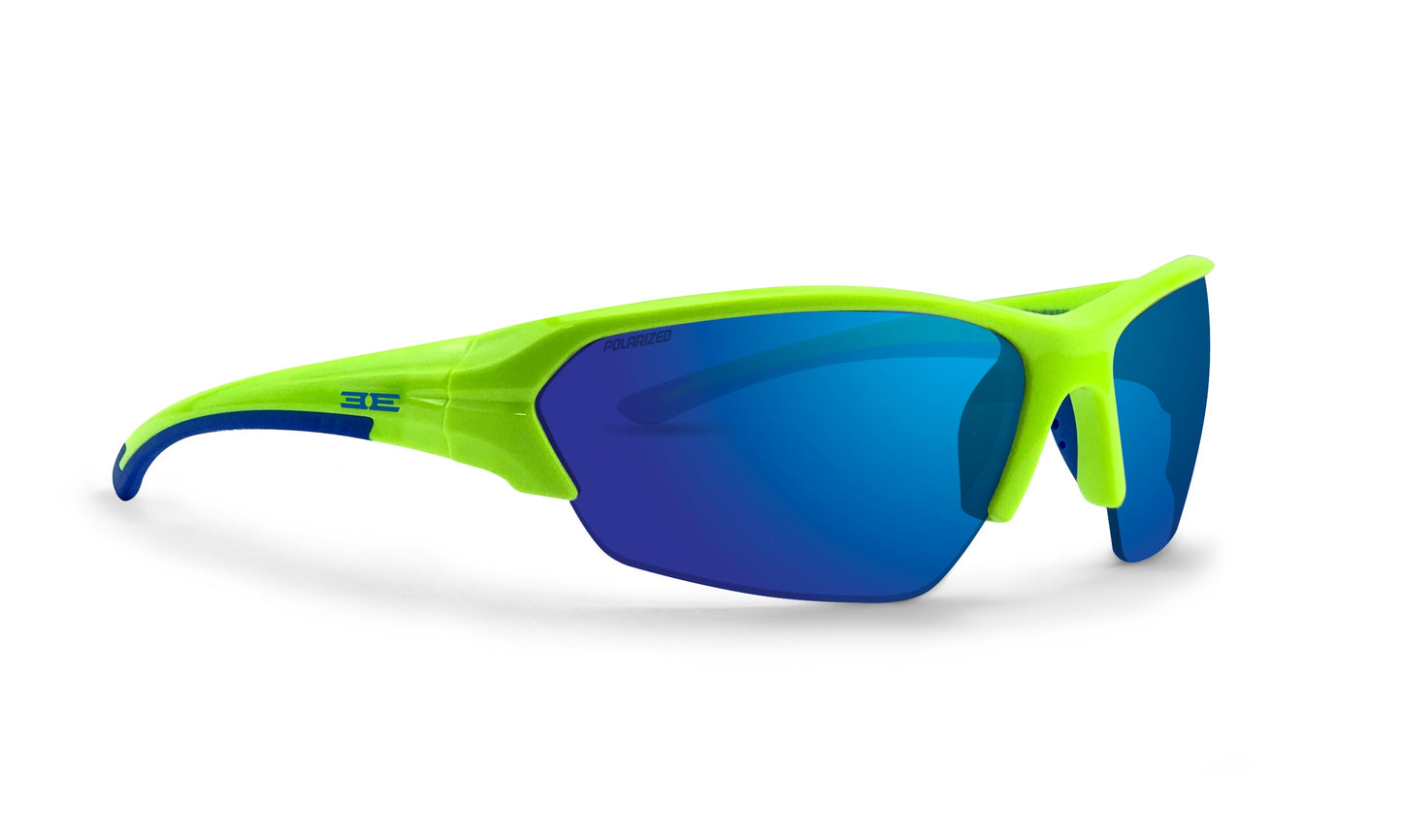 The Wake sunglasses by Epoch Eyewear feature a sporty half-frame design in neon green with blue mirrored lenses. Thick, curved arms include blue details and a stylized EE logo. These unisex shades offer a bold, modern athletic style.