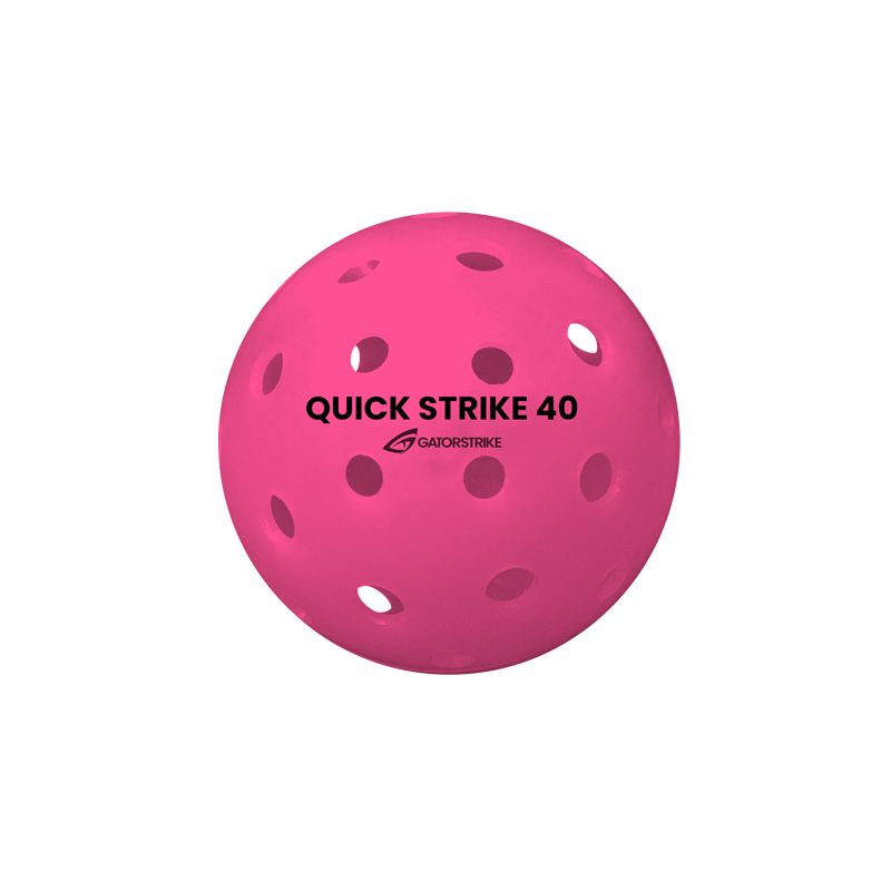 The GATORSTRIKE™ Quick Strike Pickleball is bright pink with evenly spaced holes for consistency. “QUICK STRIKE 40” and the GATORSTRIKE logo are printed in black on its surface against a plain white background.