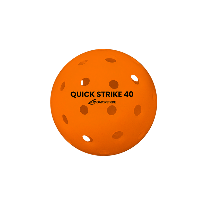 An orange GATORSTRIKE™ Quick Strike Pickleball, crafted for consistent competitive play with evenly spaced perforations. "QUICK STRIKE 40" and the GATORSTRIKE logo are printed in black. Shown on a plain white background.