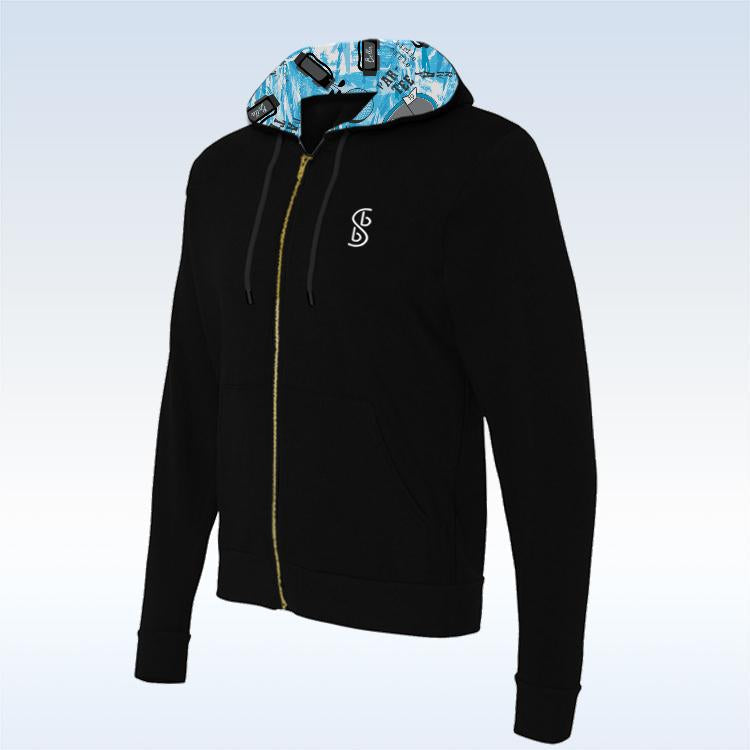 Pair the Pickleball Bella Graffiti 2 Straight Golf Skort with a black zip-up hoodie featuring a small white logo, blue and white geometric hood lining, black drawstrings, and a gold zipper. Shown on a light gradient background.