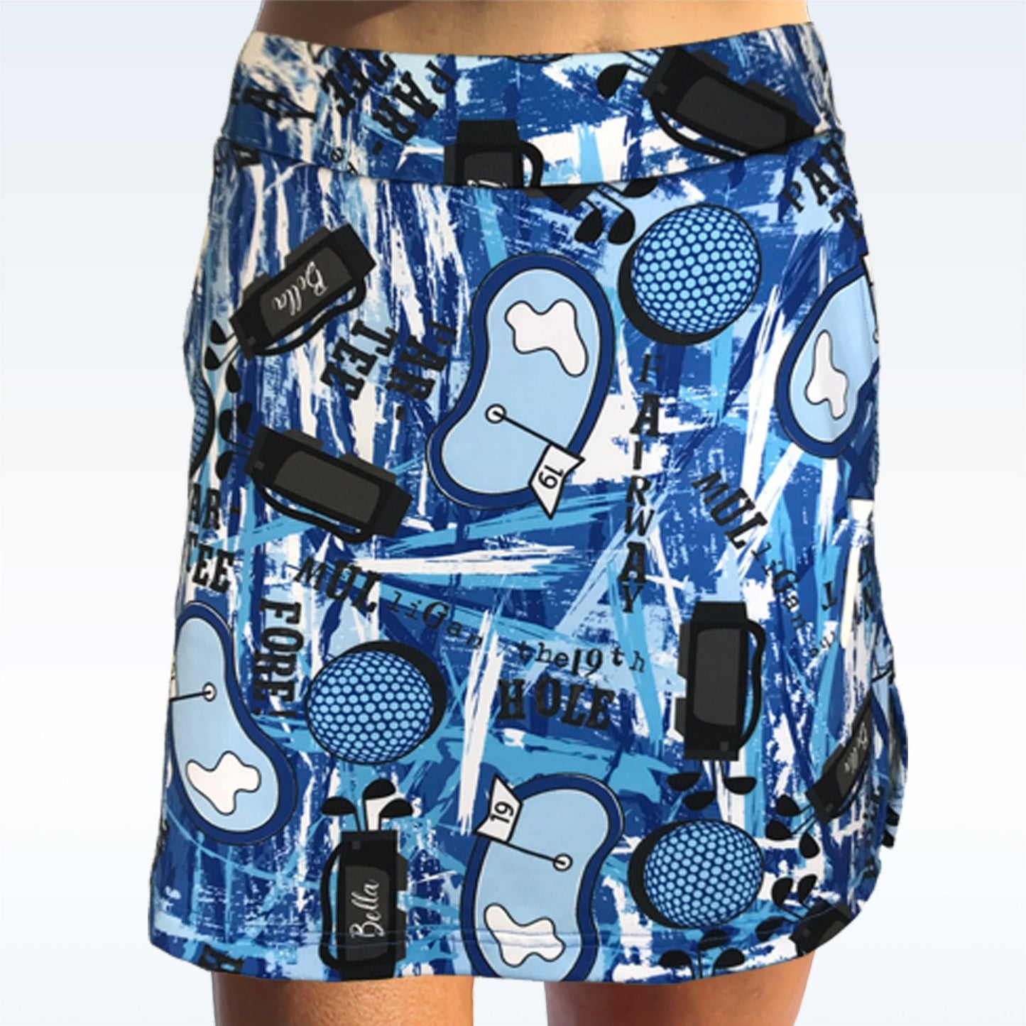 The Pickleball Bella Graffiti 2 Straight Golf Skort by Pickleball Bella features blue and white abstract patterns, golf motifs, and dynamic brush strokes, offering women an energetic, sporty look on the course.