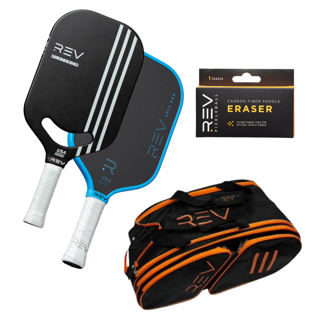 The REV Pickleball Professional - Mix & Match - Bundle for 2 includes two black paddles with white and blue accents, a carbon fiber paddle eraser in a black box, and a black sports bag with orange stripes, all on a white background.