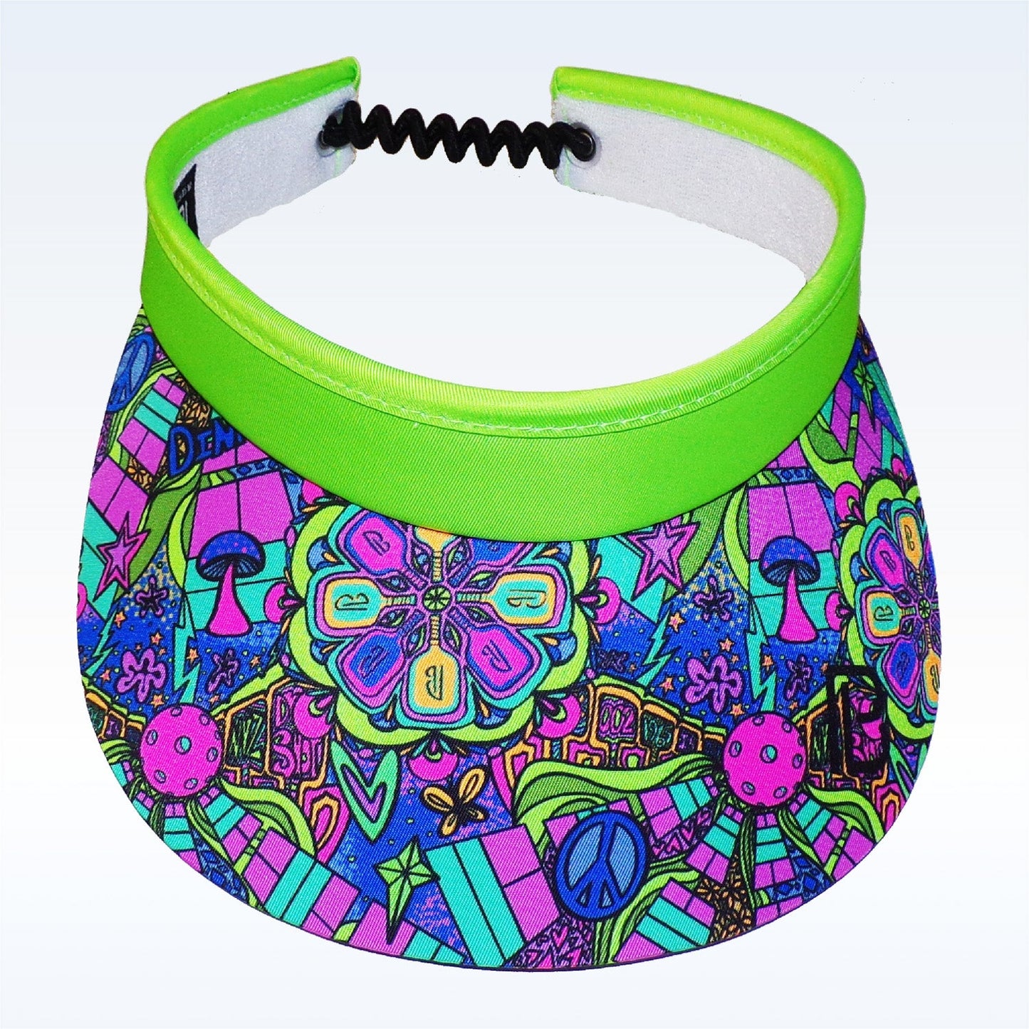 The PB Visor Groovy by Pickleball Bella features a wide brim with psychedelic green patterns, lightweight quick-dry fabric, and a black elastic strap for comfort.