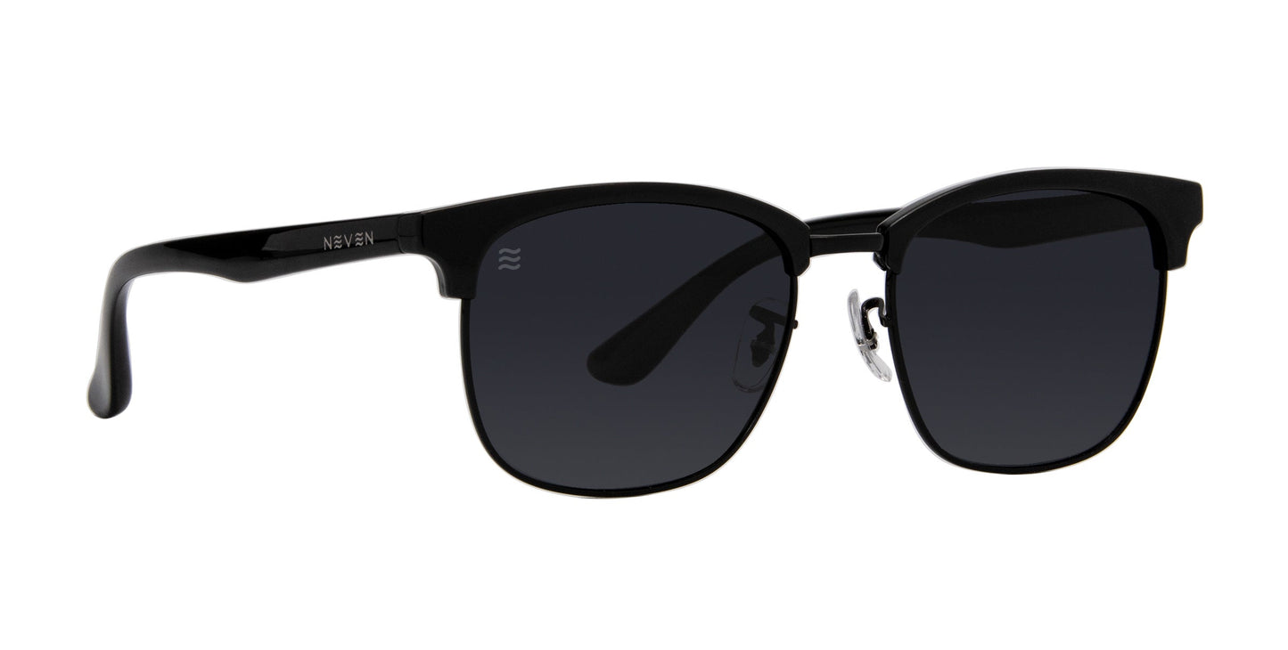 Stealth by Neven Eyewear: stylish black polarized sunglasses with glossy TR90 frames, dark rectangular lenses, slight browline design, UV400 protection, metal hinge accents, adjustable nose pads, and “NEVEN” branding on the left arm.