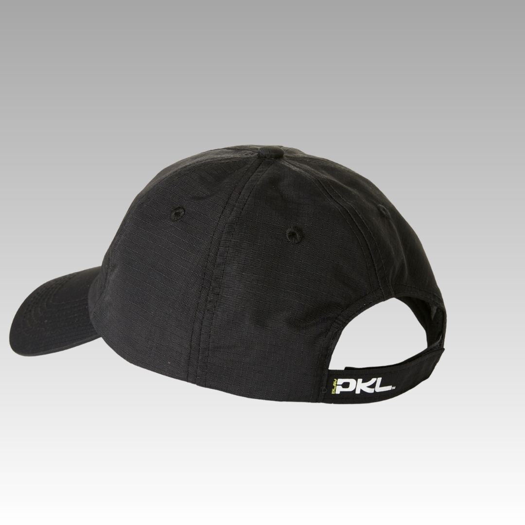 The Playly Store Hi Hat Pickleball Hat is shown from the back on a gradient gray background. Made of moisture-wicking ripstop nylon, it has an adjustable strap with a small black-and-white “PKL” tag and no other visible branding.