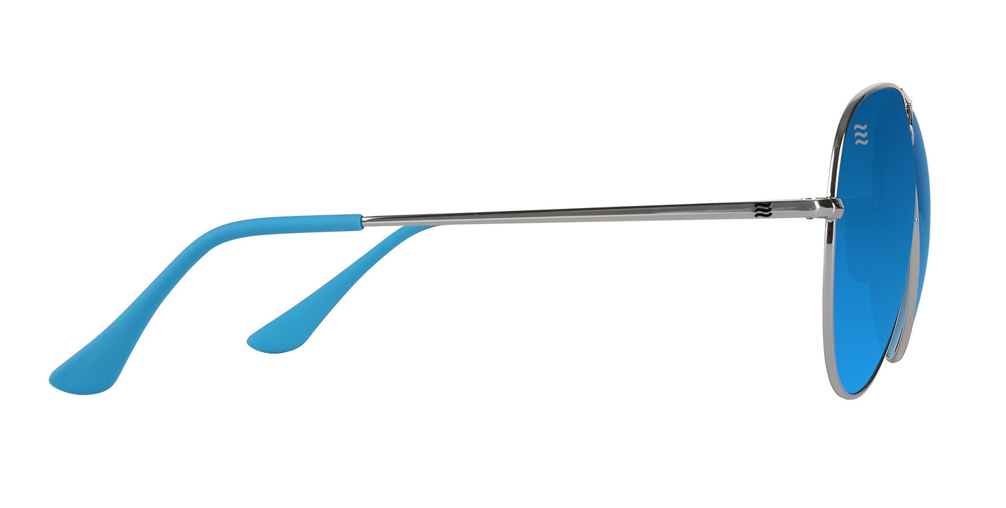 Side view of Neven Eyewear's H2O aviator sunglasses, featuring silver stainless steel frames, bright blue arms, and blue-tinted UV400 lenses for eye protection, shown against a white background.